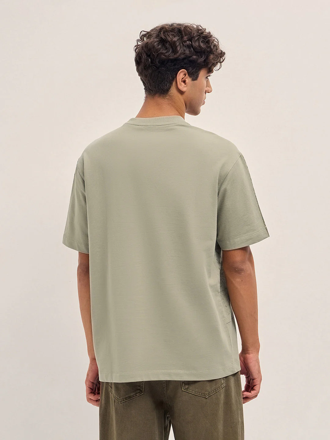 Beige Crew Neck T-Shirt with Abstract Bicycle Graphic Print - Image 2