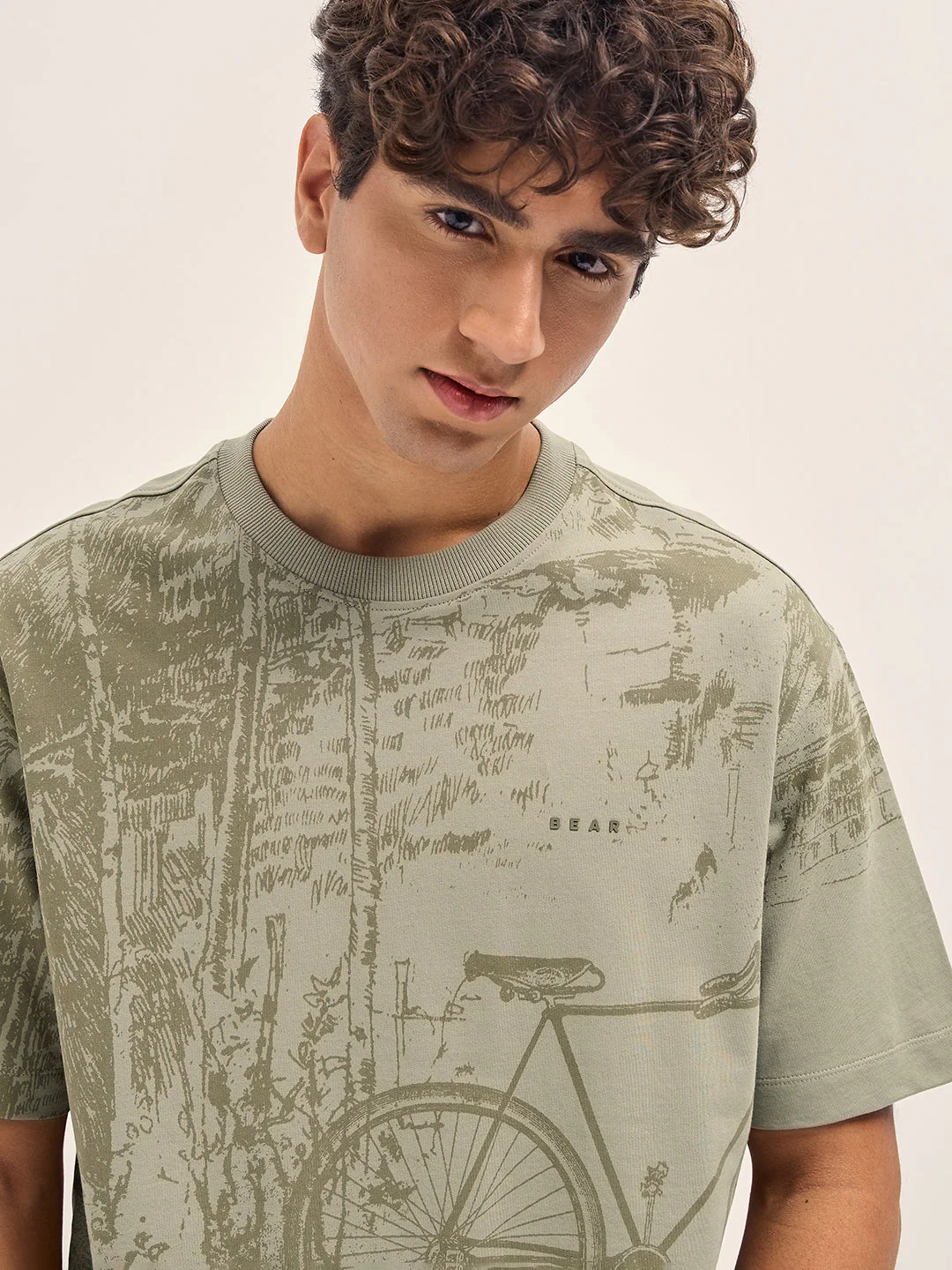 Beige Crew Neck T-Shirt with Abstract Bicycle Graphic Print - Image 5