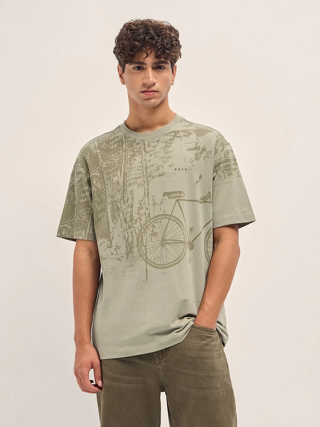 Beige Crew Neck T-Shirt with Abstract Bicycle Graphic Print - Image 6